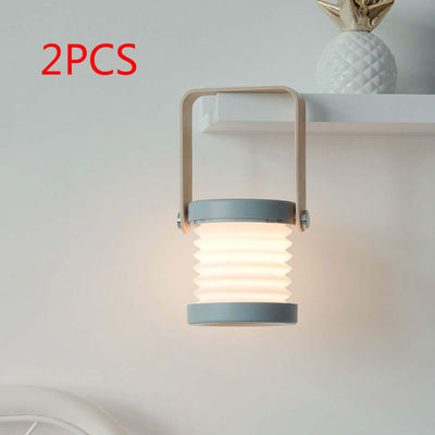 Foldable Touch Dimmable Reading LED Night Light Portable Lantern Lamp USB Rechargeable For Home Decor on display.