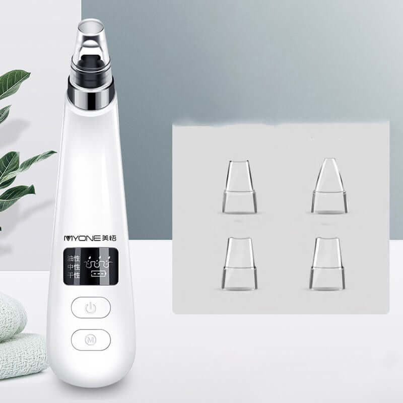 Electric blackhead artifact with interchangeable tips for effective skin care and cleansing.