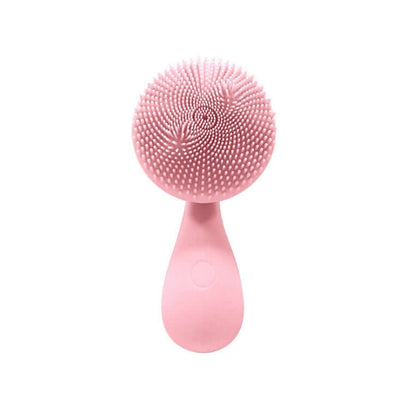 Electric face washer in pink silicone, designed for cleansing and massage with waterproof features.