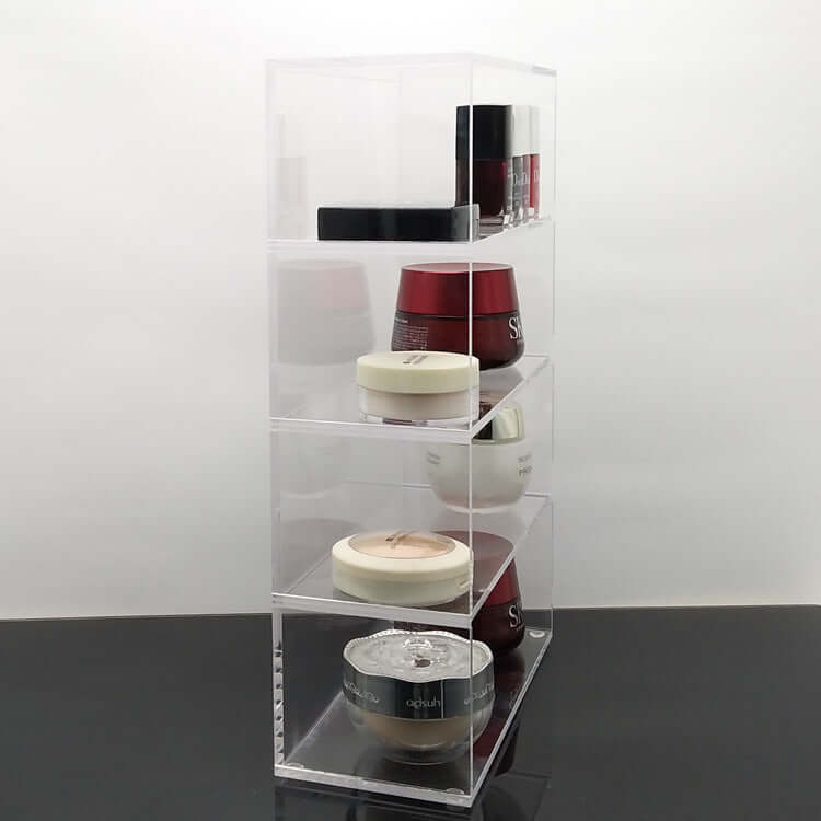 Acrylic storage box cosmetics displaying various beauty products in a clear, organized manner.