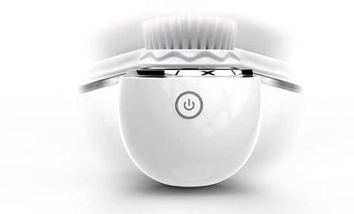 Ultrasonic electric face washer with circular brush and power button, designed for effective facial cleansing.