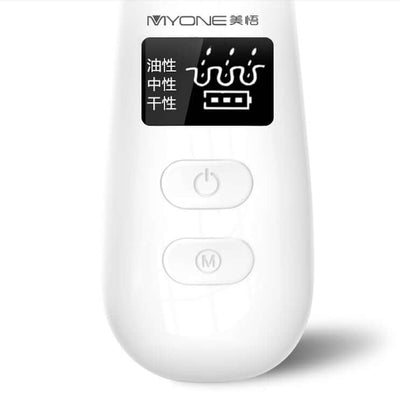 Electric blackhead artifact device with control buttons and display for skincare treatment.